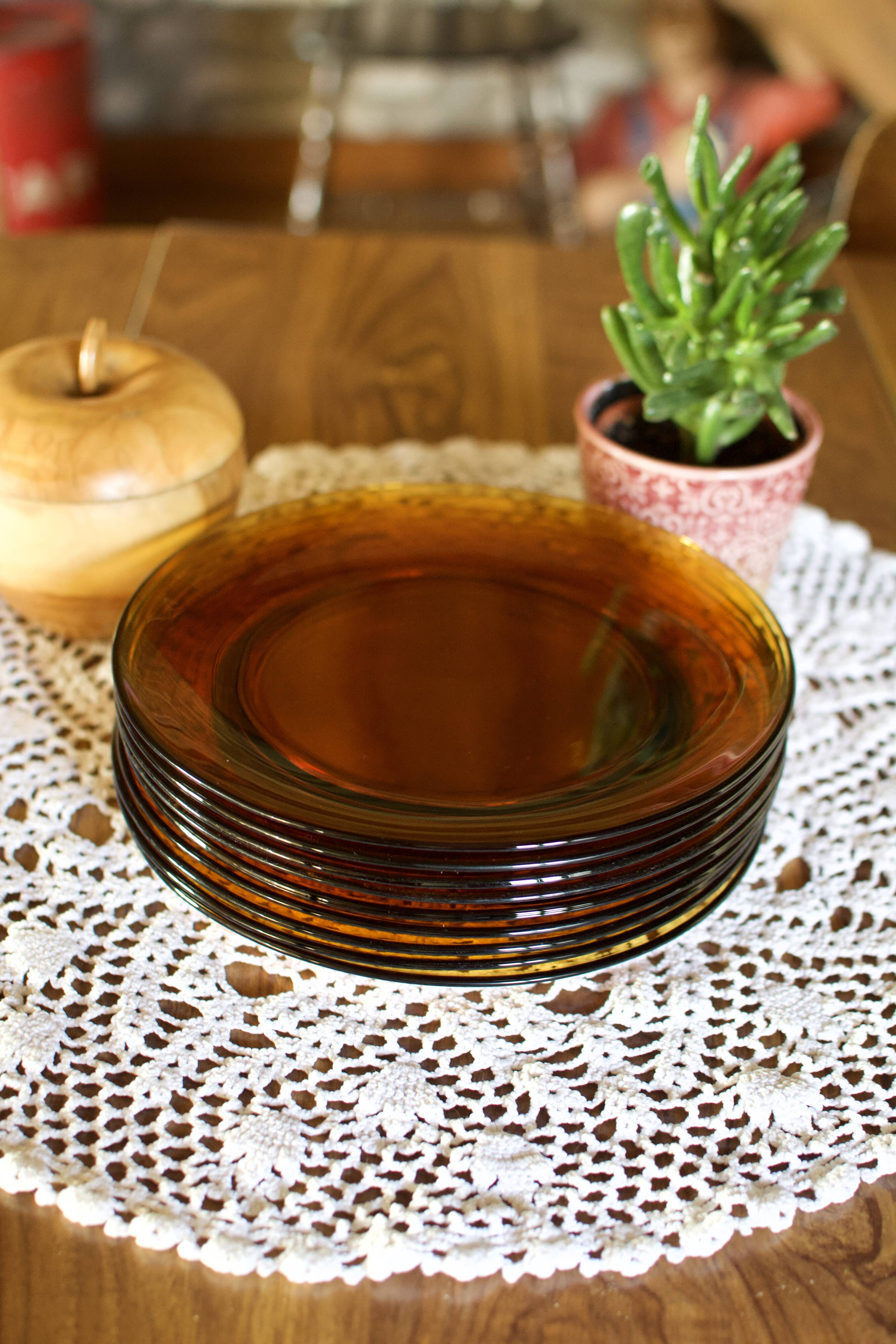 Set of 9 vintage plates in amber glass France