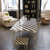 Iron table with top in black and white ceramic tiles