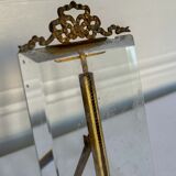 Frame in brass and beveled glass