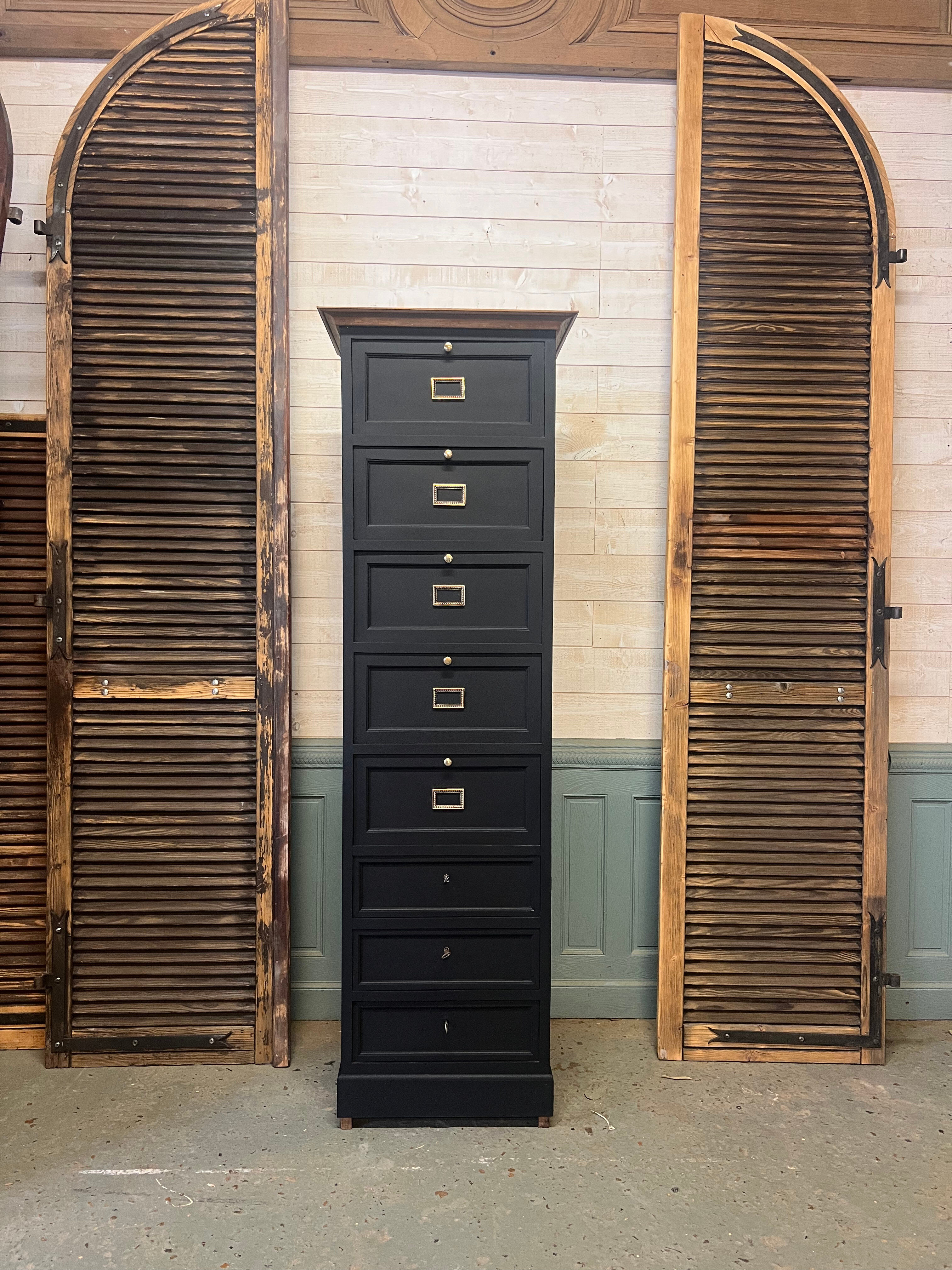 Cabinet with flaps and drawers