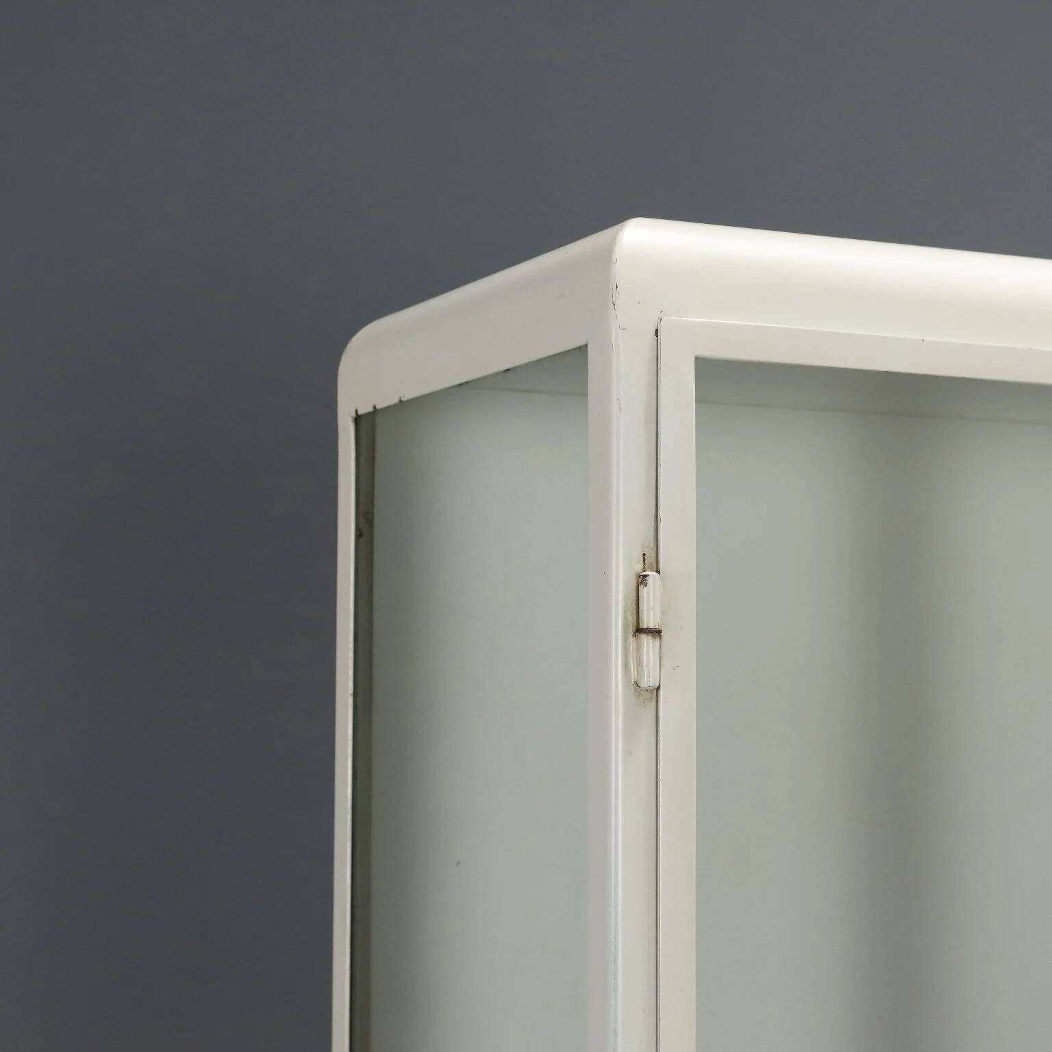 Antique enamelled iron and glass display cabinet, Italy, 20th century