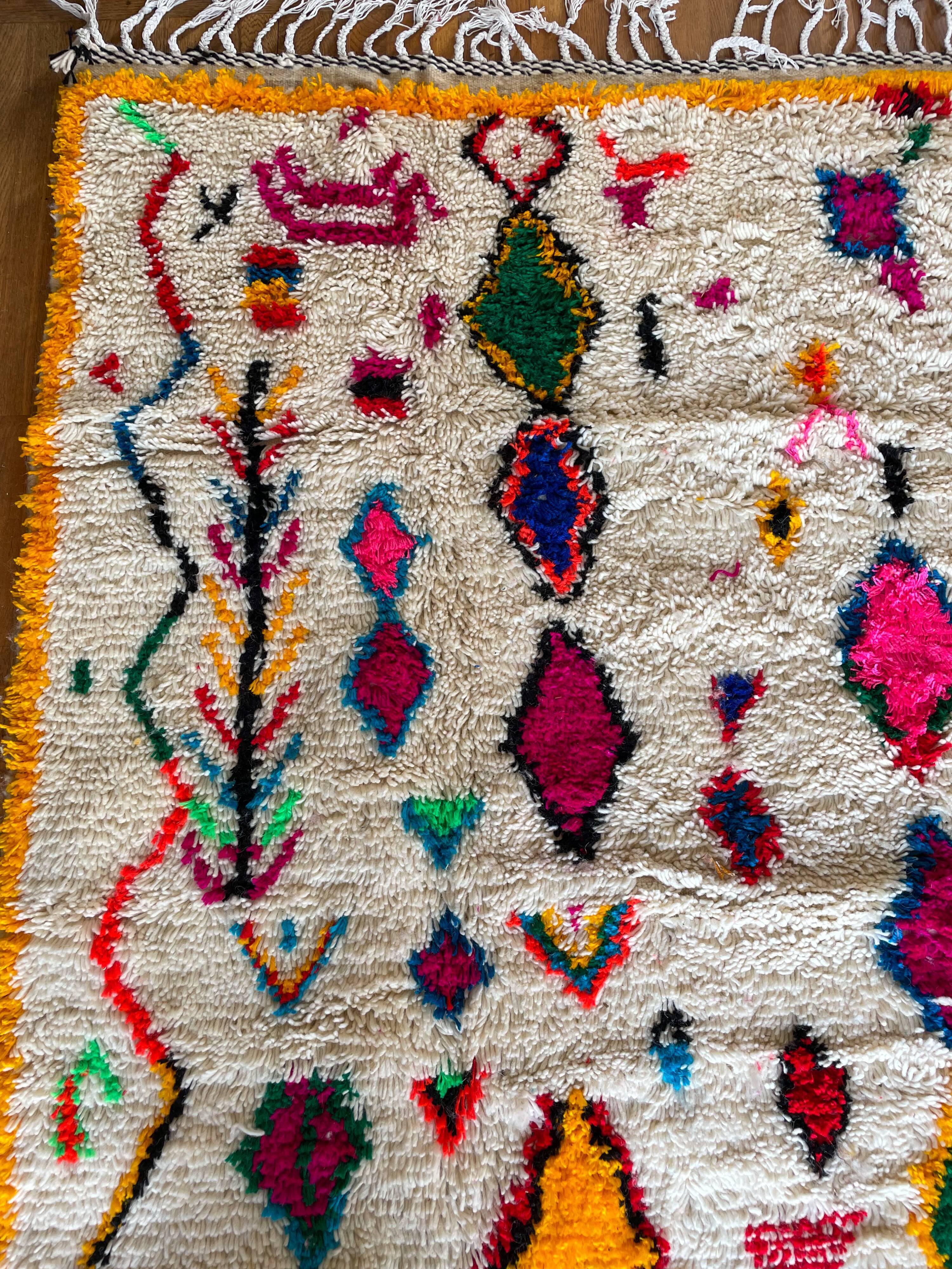 Berber carpet azimuth colored white with multicolored and fluorescent patterns