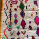 Berber carpet azimuth colored white with multicolored and fluorescent patterns