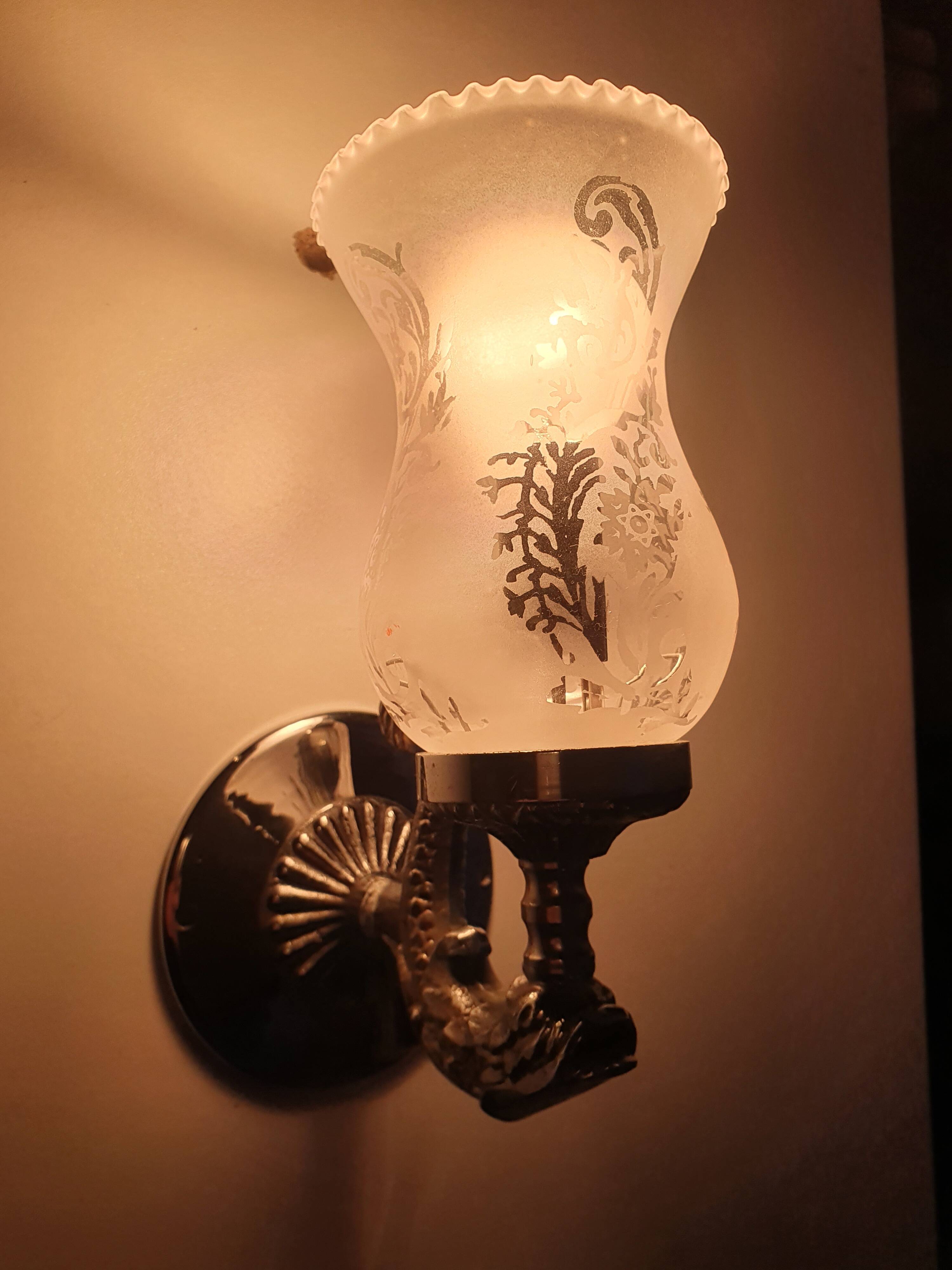 Pair of vintage chrome wall sconces