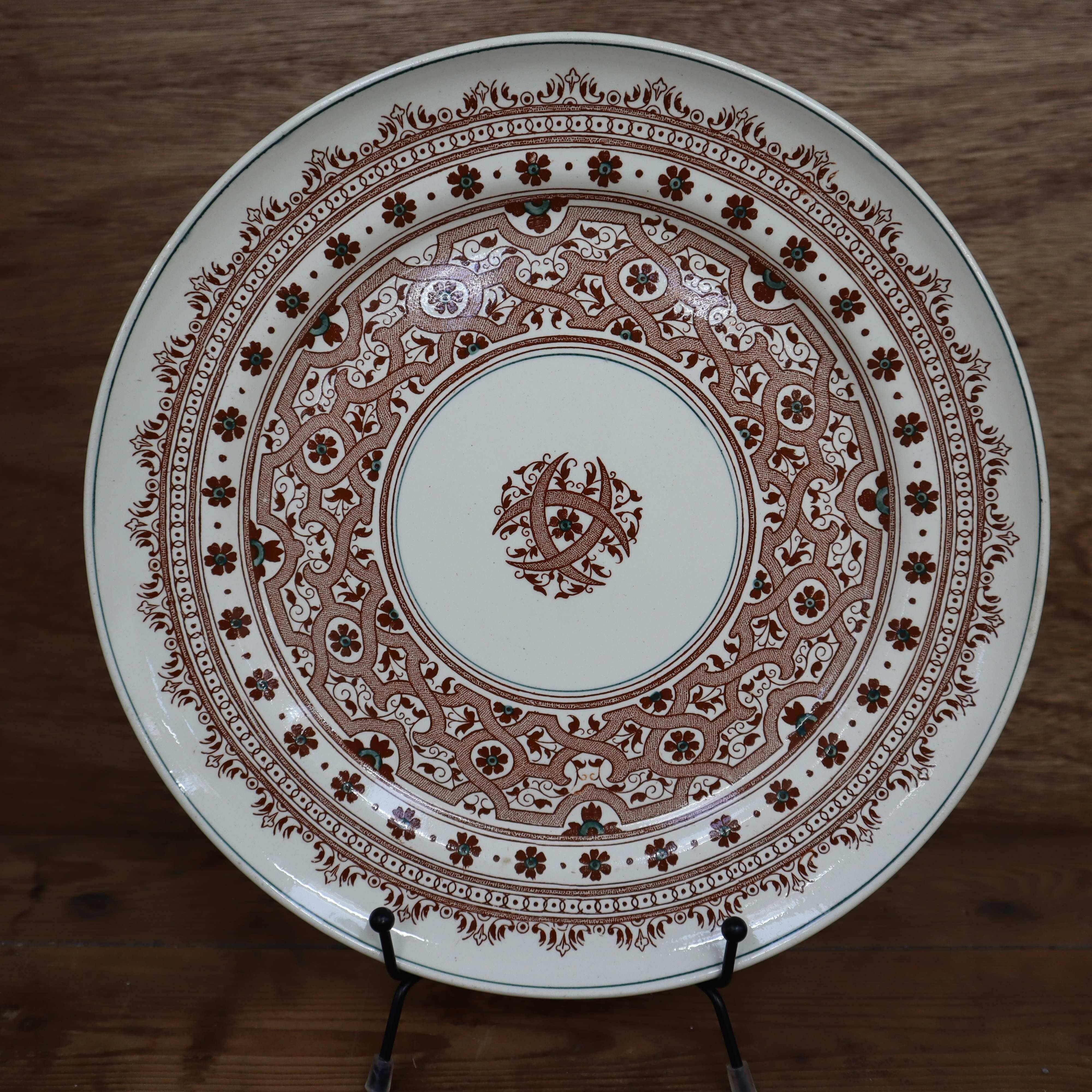 Old 26cm dish in Terre de Fer earthenware from Longwy, Henri II model