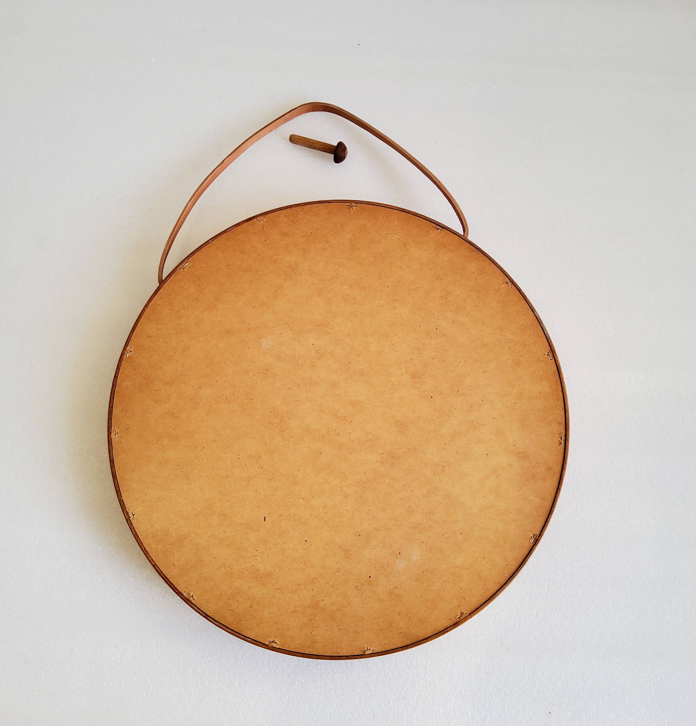 Round teak mirror by Uno and Osten Kristiansson for Luxus Vittsjö, Sweden.