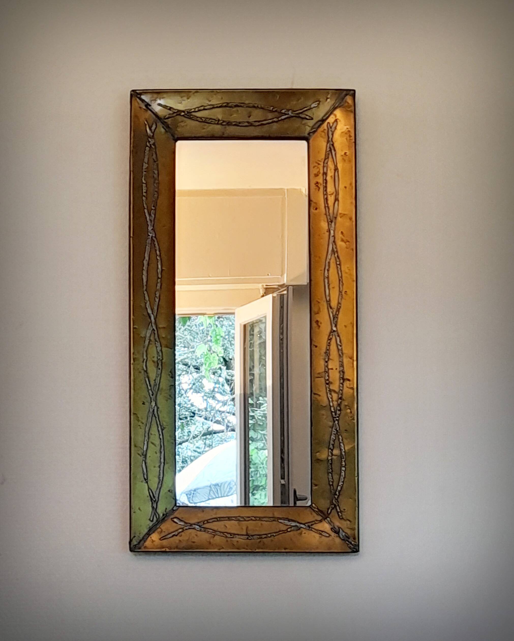 Brutalist brass mirror by Jean Goardere, France, 1970s