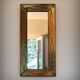 Brutalist brass mirror by Jean Goardere, France, 1970s