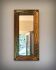 Brutalist brass mirror by Jean Goardere, France, 1970s