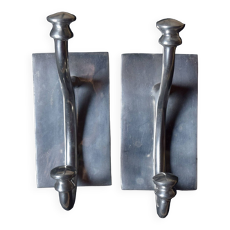 Pair of vintage cast aluminum coat hooks