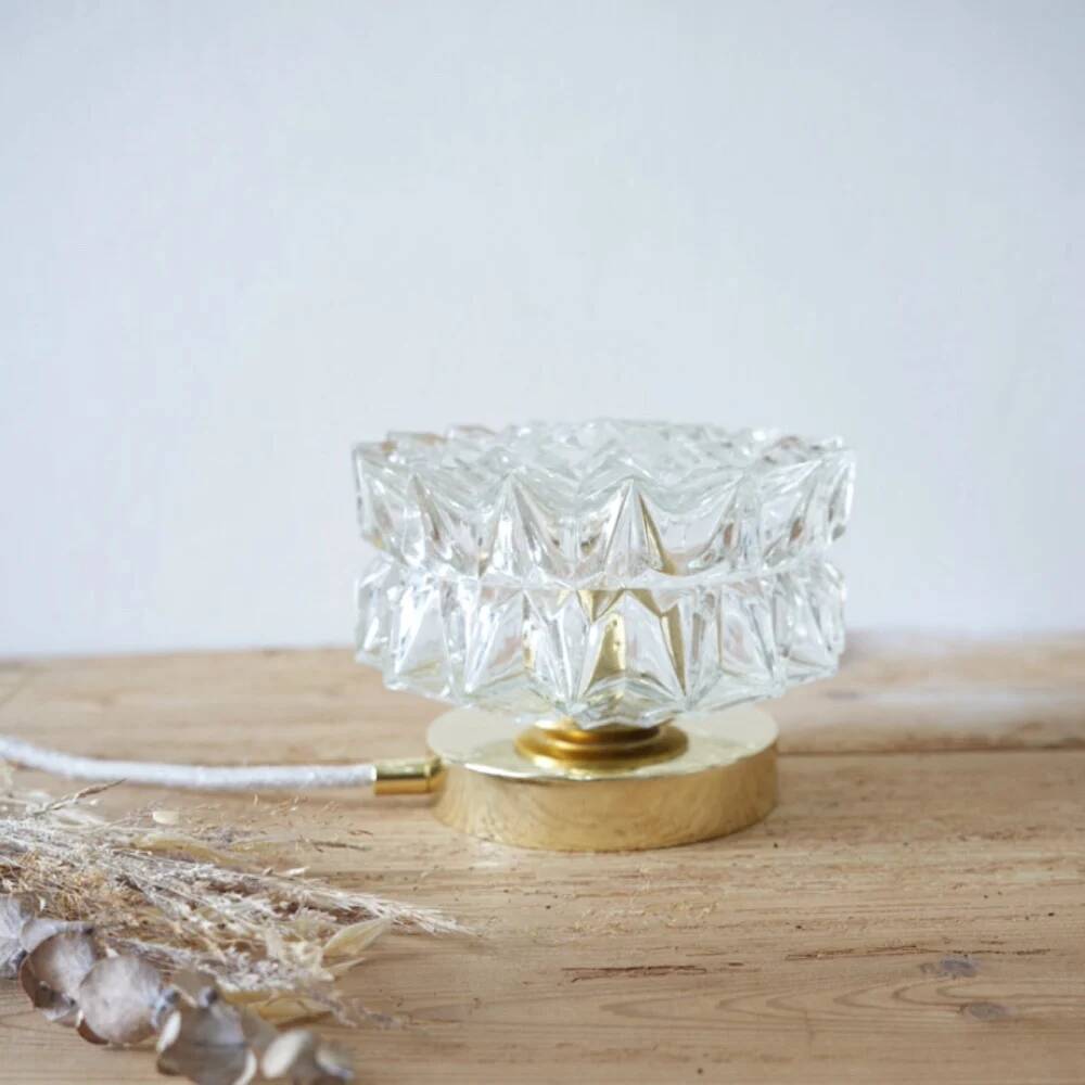 Table lamp with cut glass in the shape of a star.