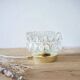 Table lamp with cut glass in the shape of a star.