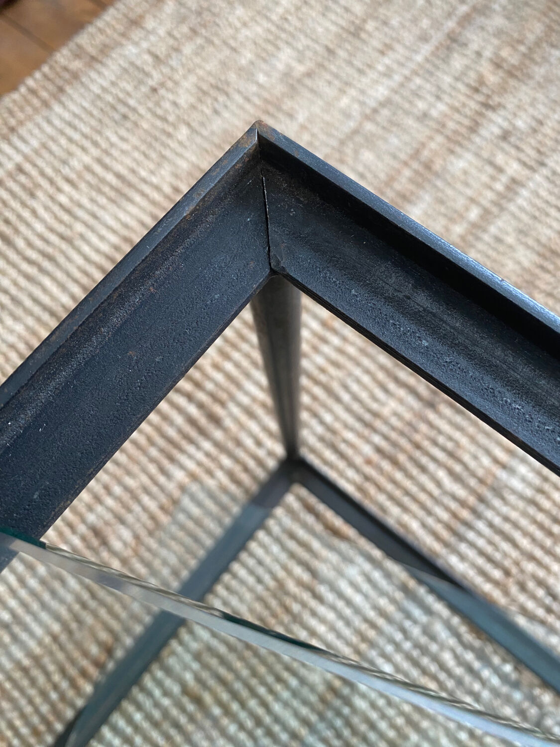 Glass and wrought iron coffee table design