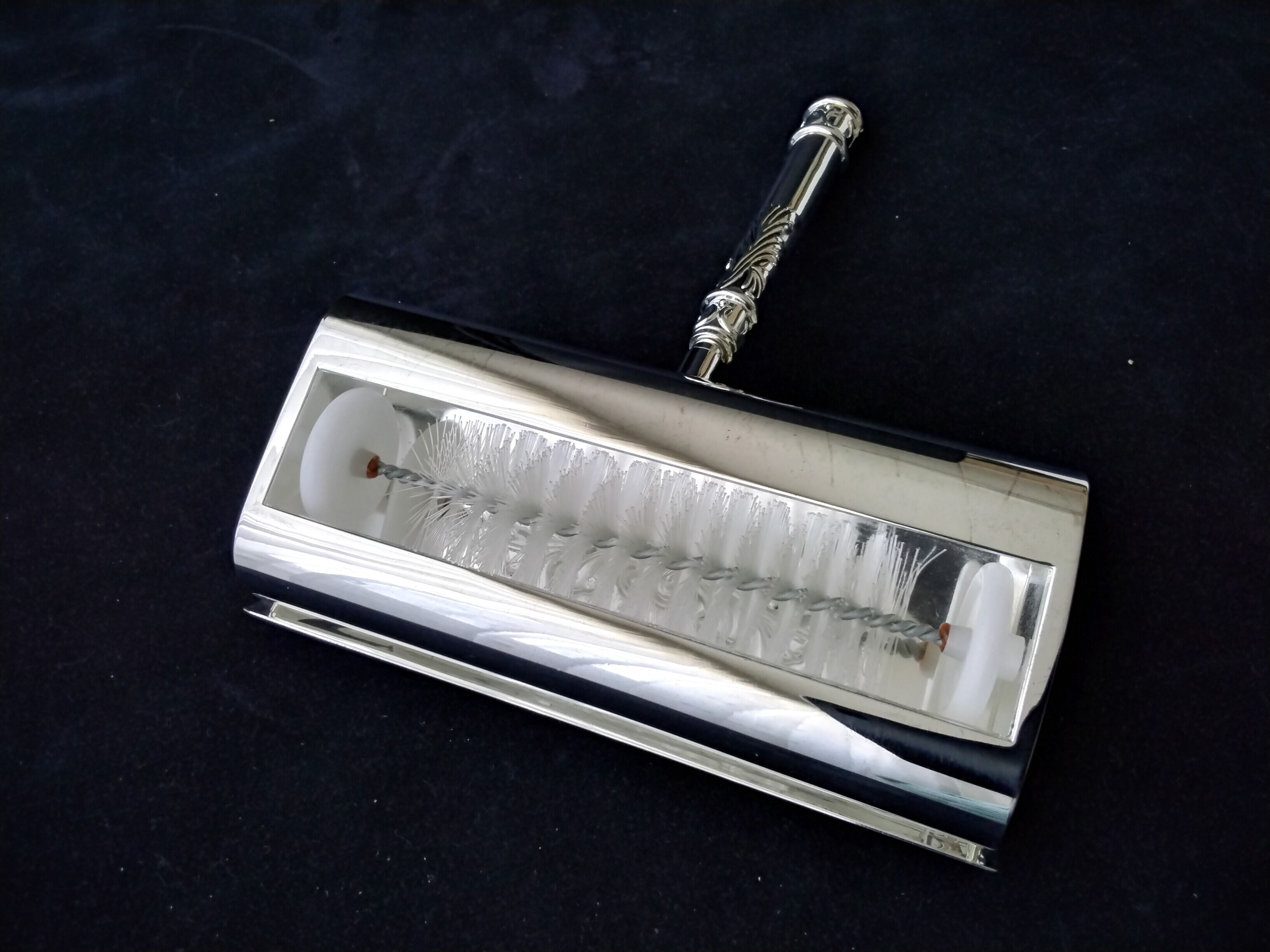 Silver metal roller crumb picker