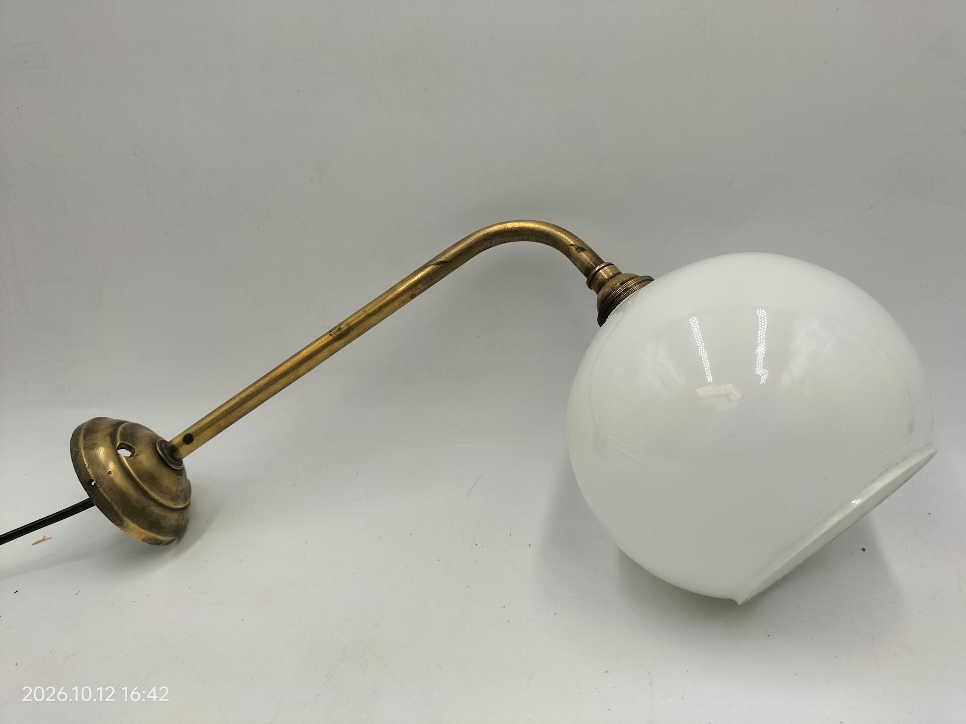 Brass and glass wall light