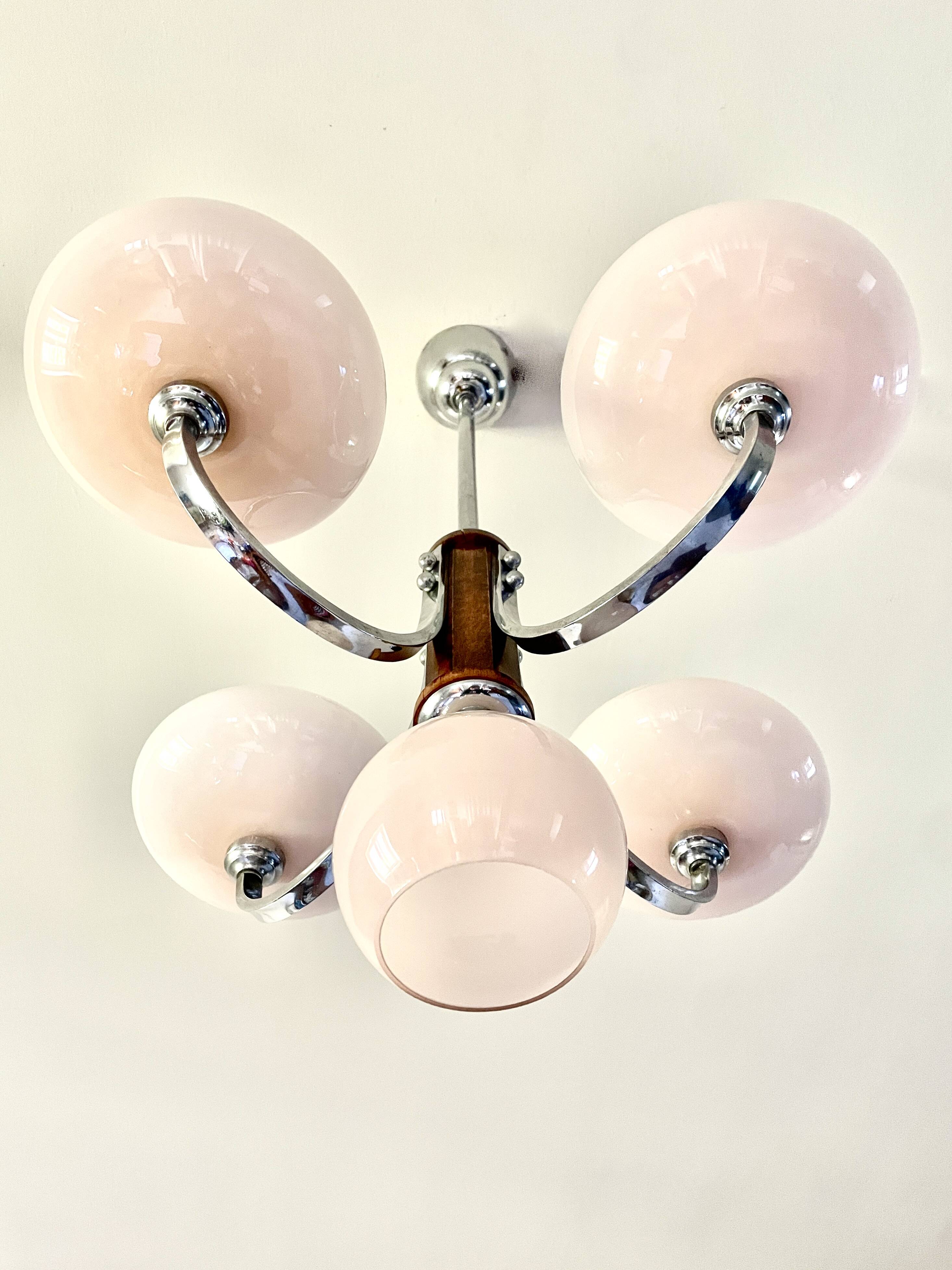 Art Deco lustre with pink glass, wood, and chrome from the 1930s.