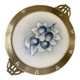 Art Nouveau plate in earthenware with a brass frame