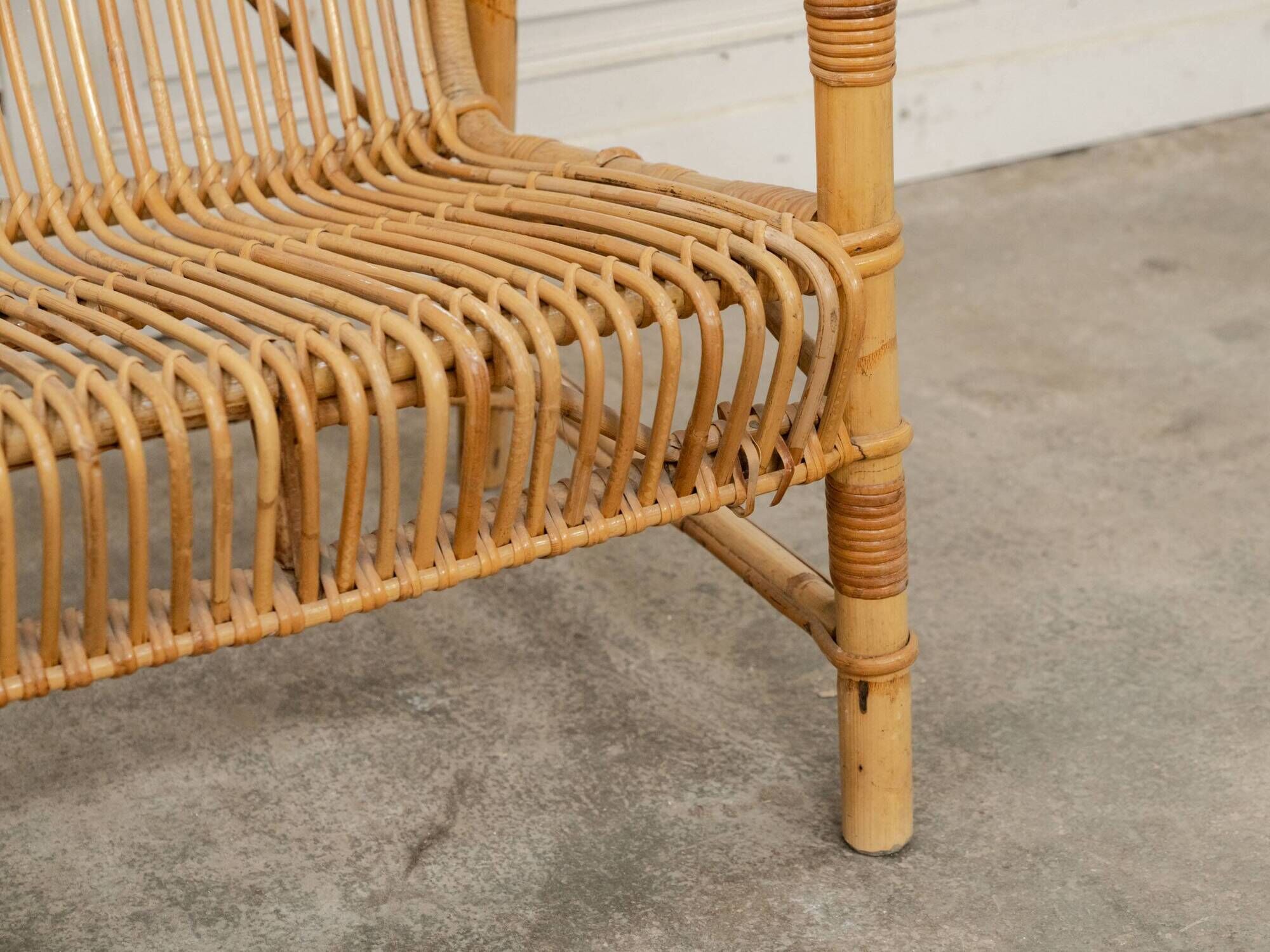 Vintage bamboo and rattan bench from the 1970s.