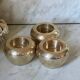 Trois bougeoirs en laiton