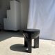 Black mango wood tripod side table with a semi-spherical top, height: 45 cm, diameter: 44 cm.