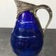 Former pitcher carafe art de blue moulded glass - vintage metal anse