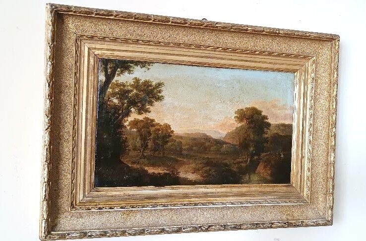 Antique painting on canvas depicting a bucolic landscape