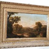 Antique painting on canvas depicting a bucolic landscape