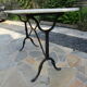 Antique marble bistro table and cast iron foot