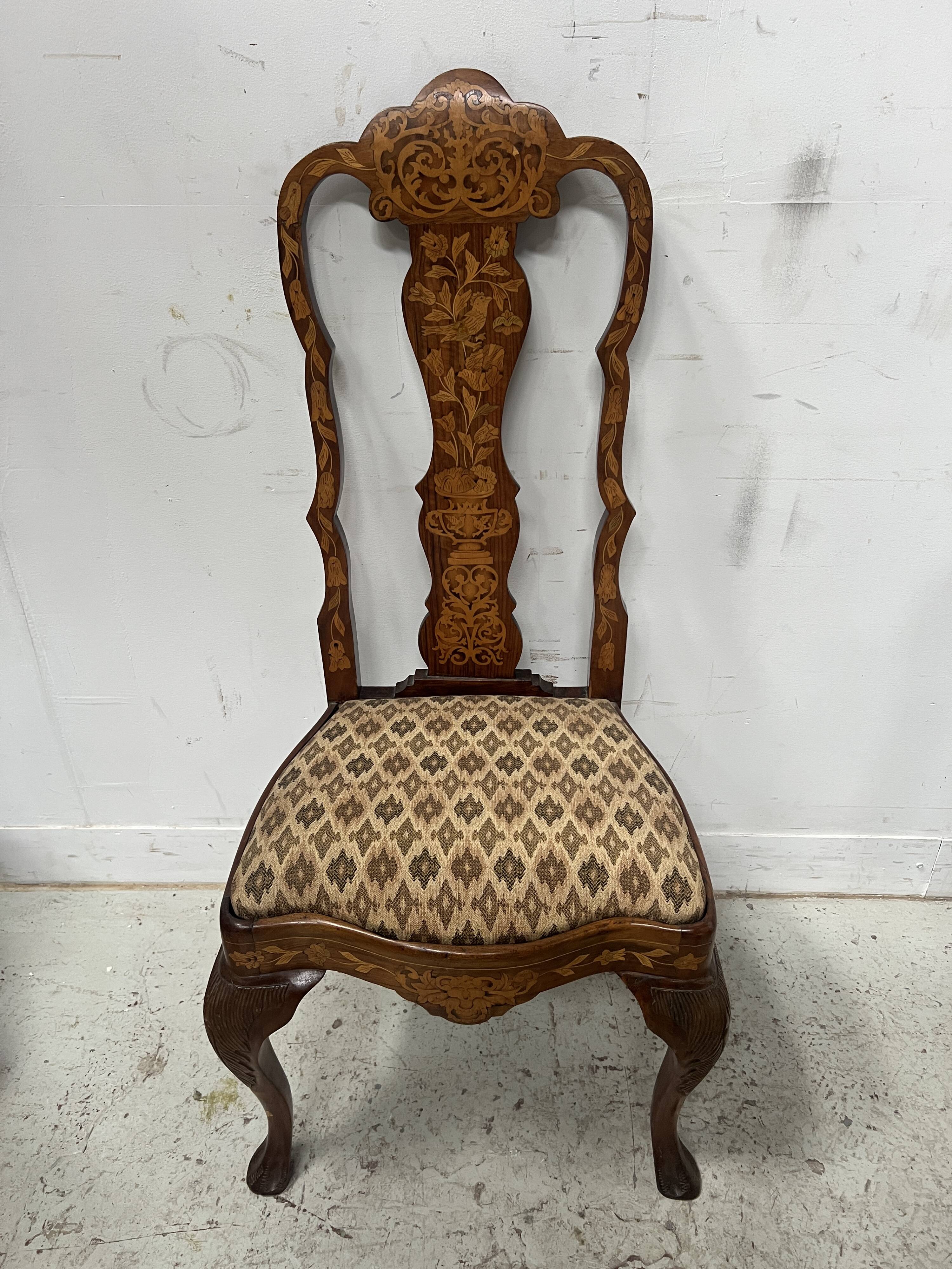 Set of eight Dutch marquetry chairs from the 19th century.