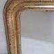 Golden Louis Philippe mirror H122xW84cm with gilded motifs.
