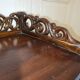 Antique Art Nouveau shelf in carved wood