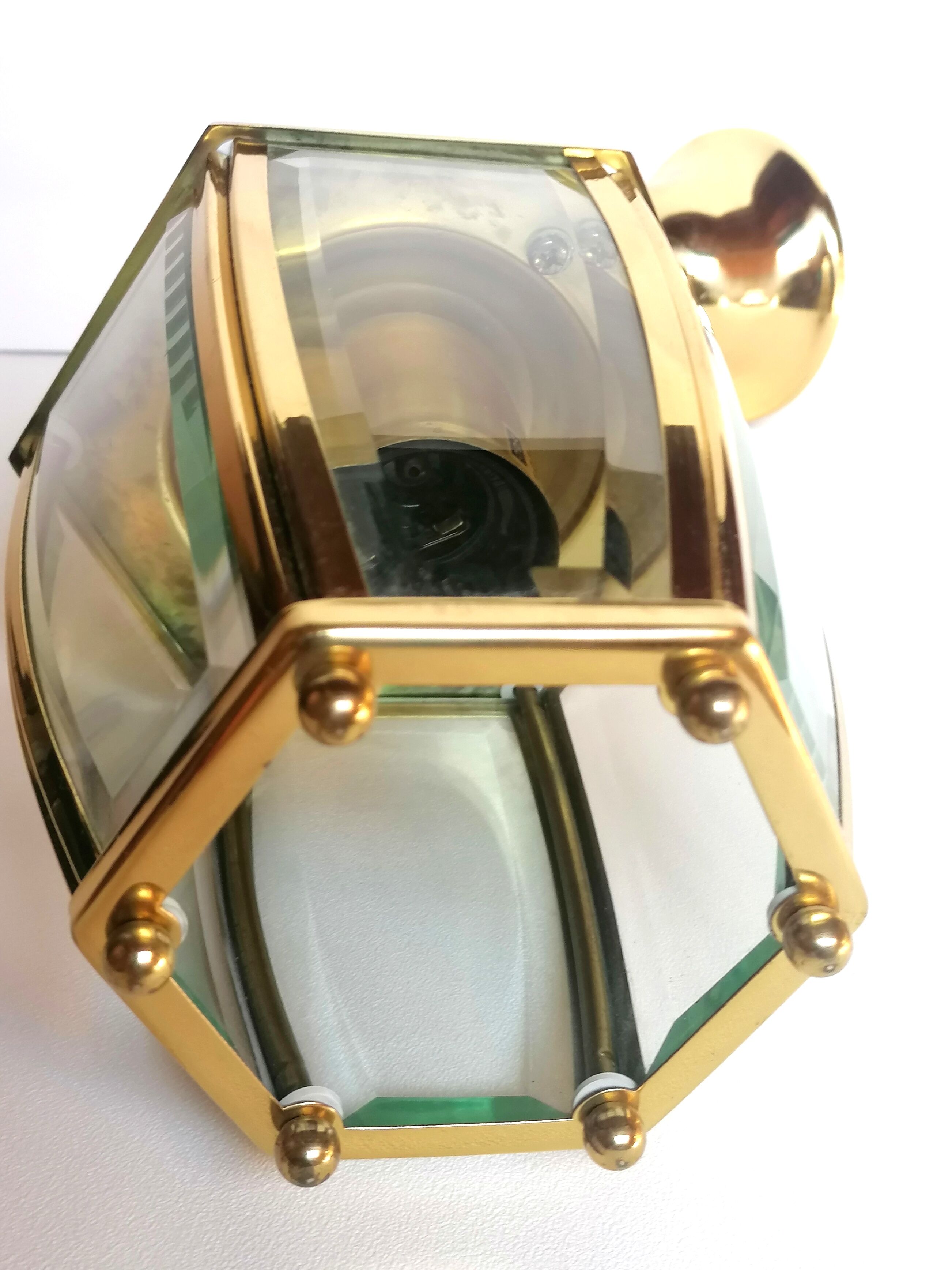 Golden hanging lamp with bevelled glasses