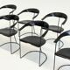 Ensemble de 8 chaises de salle à manger vintage Arrben Ursala en cuir noir.
