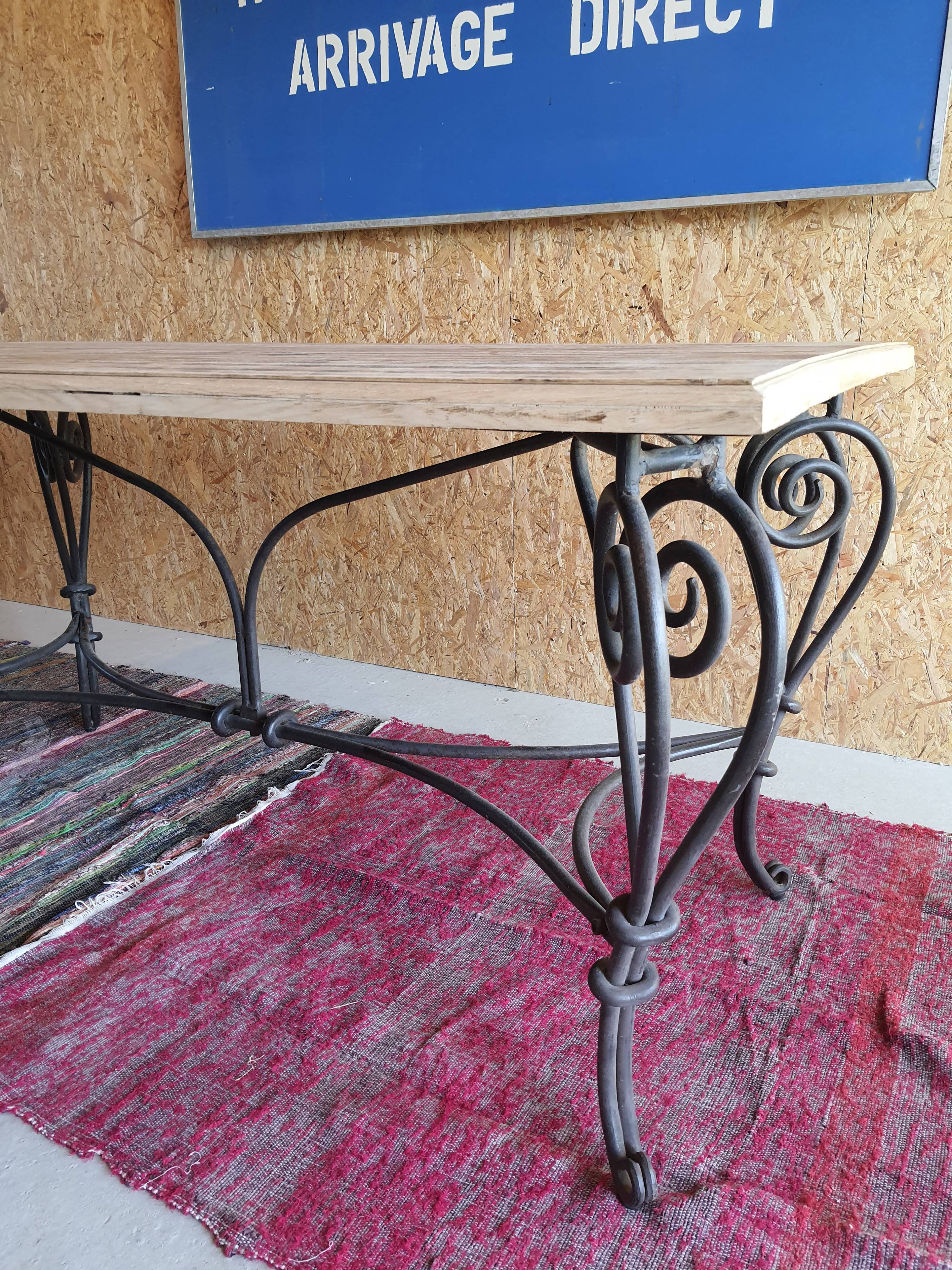 Wooden and wrought iron table