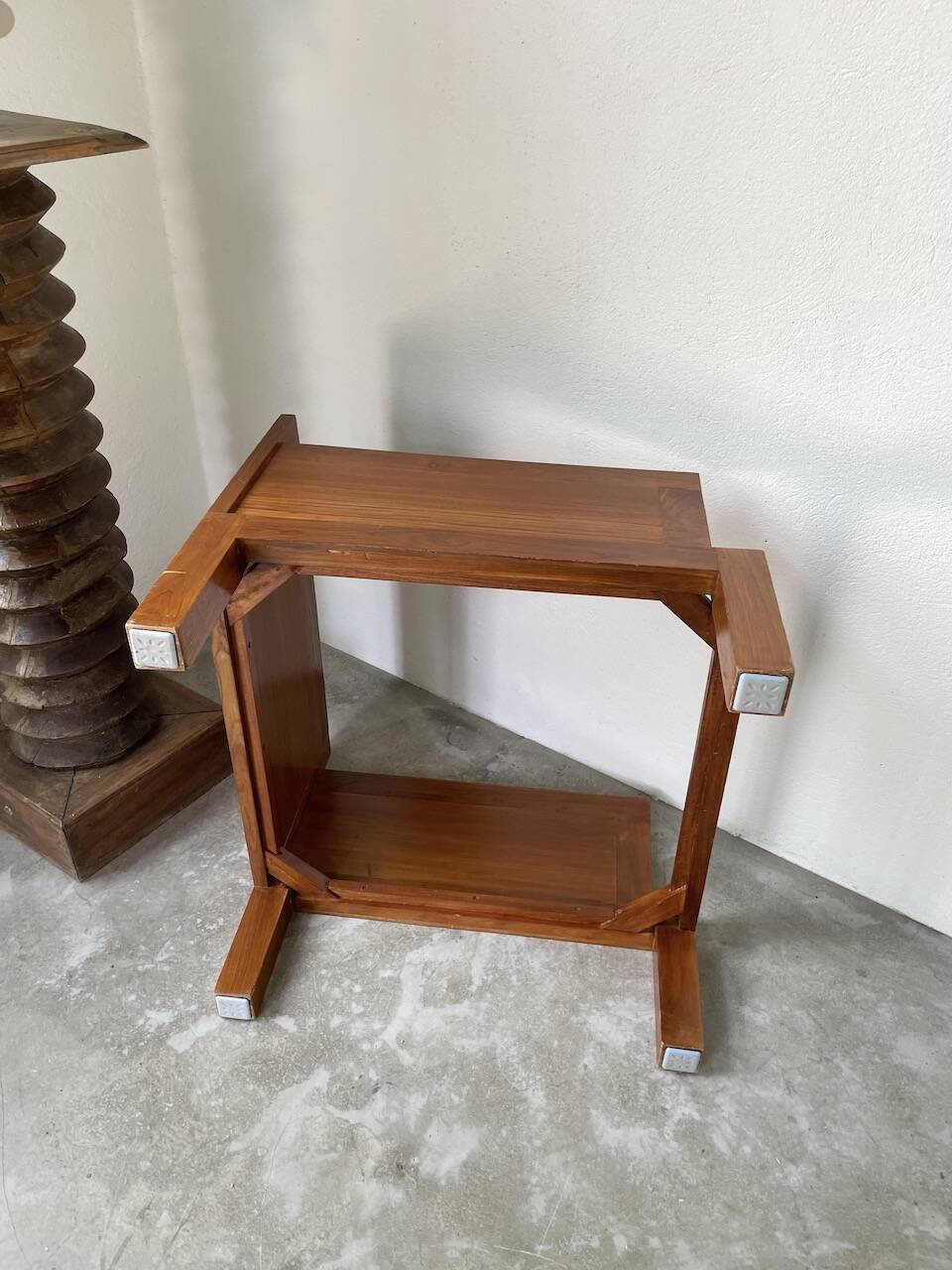 Modernist armchair in exotic wood and leather