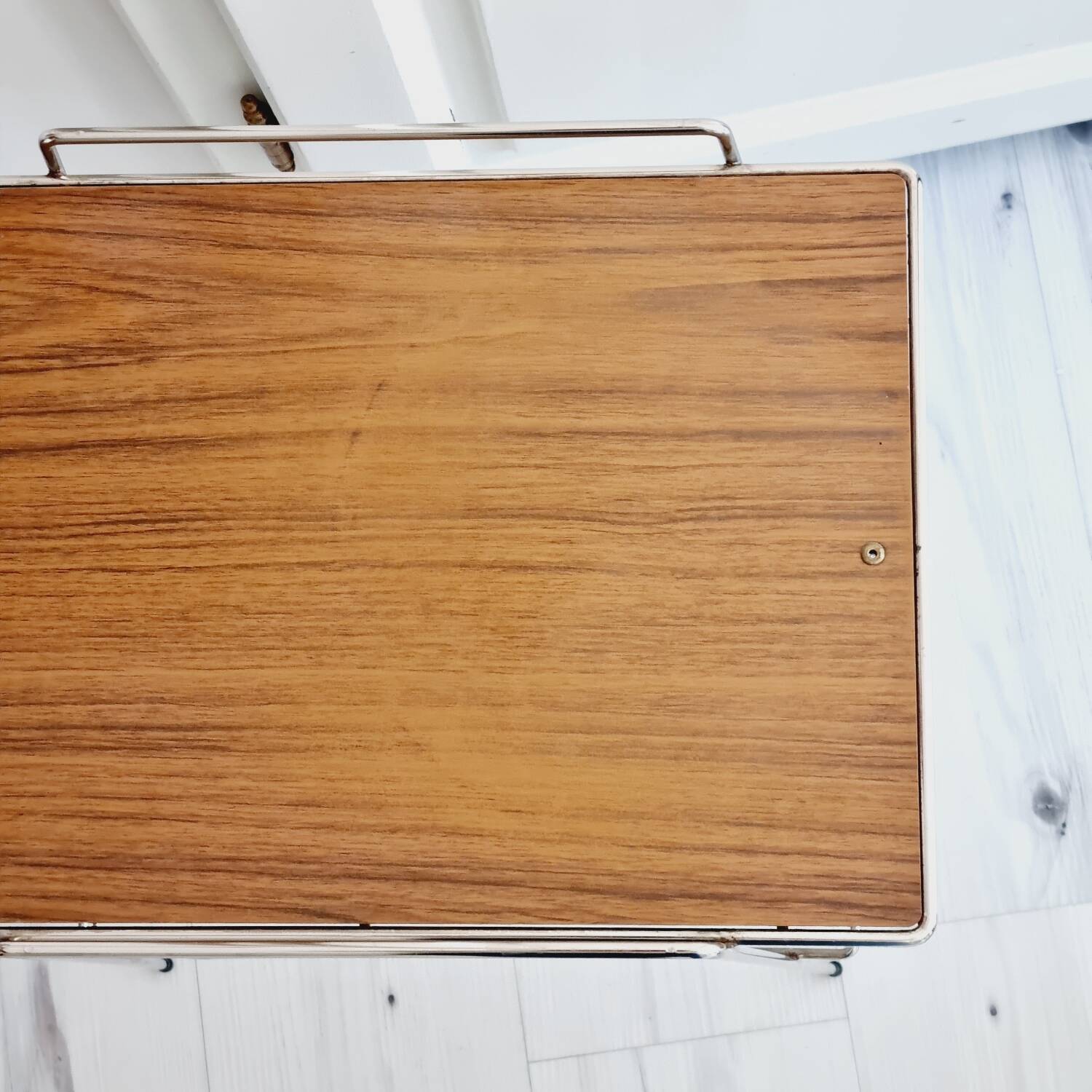 Metal and Formica magazine rack side table