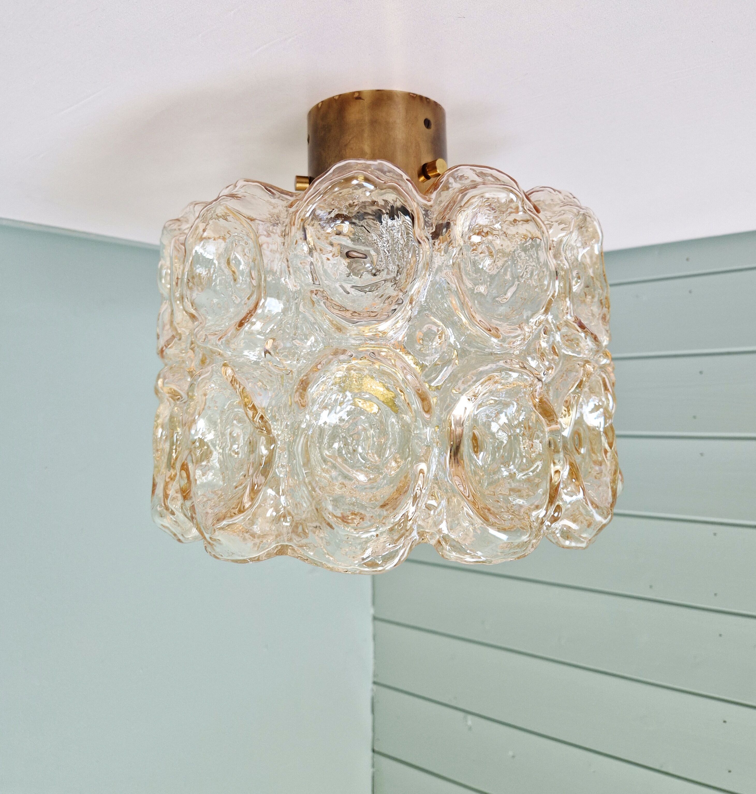 Brass and amber textured glass ceiling light, design by Helena Tynell, Limburg.