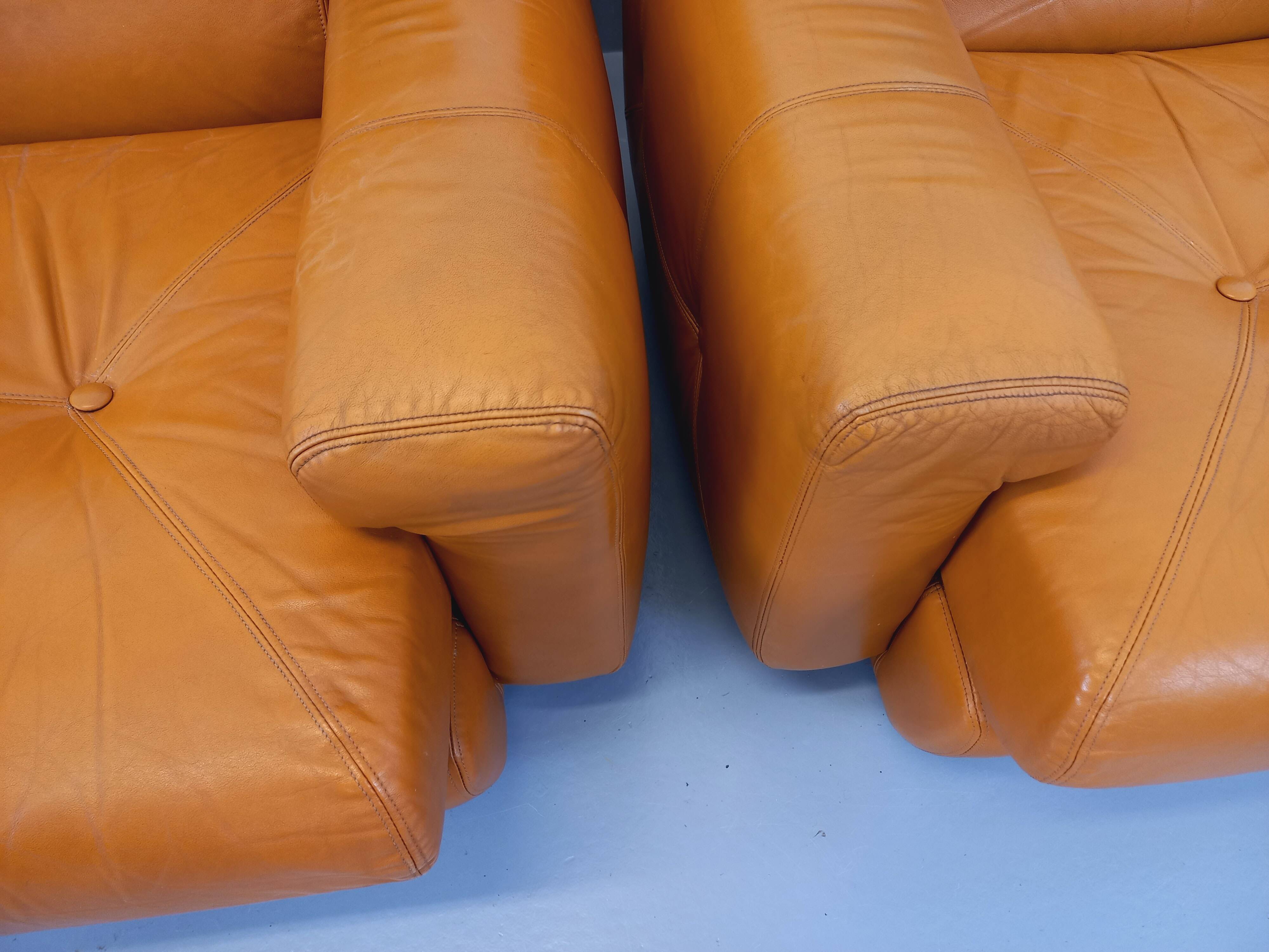 Pair of vintage leather lounge chairs from the 60s and 70s