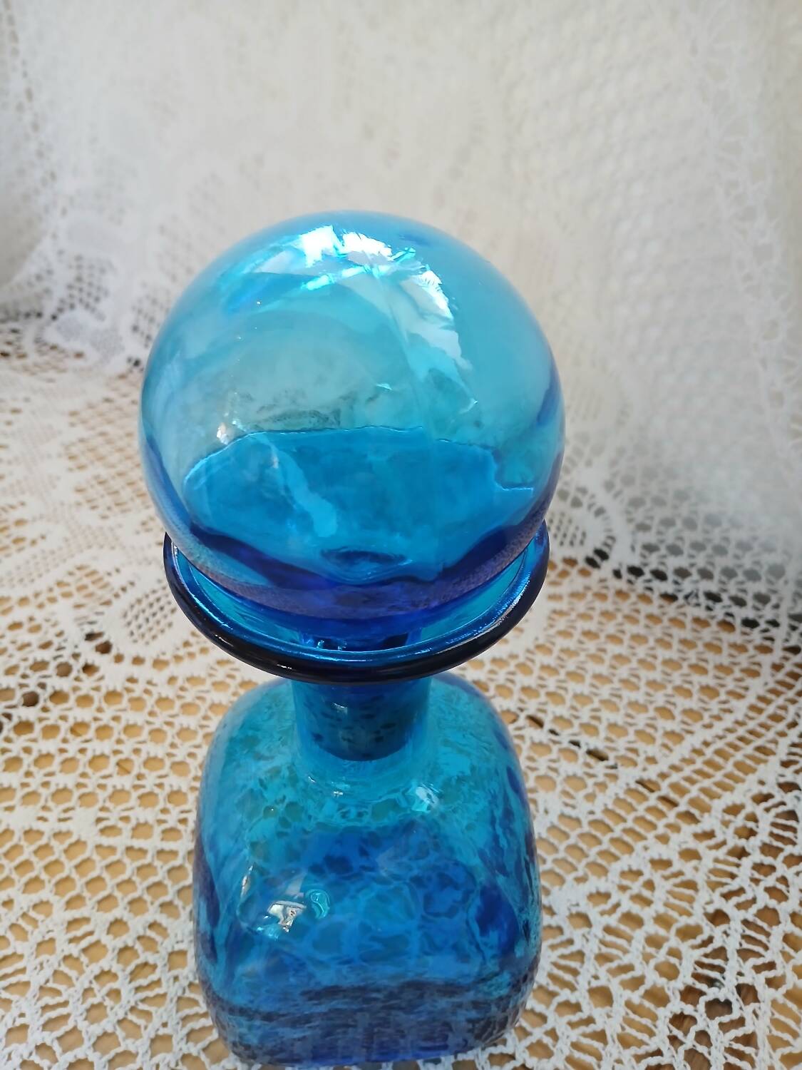 Blue embossed glass carafe