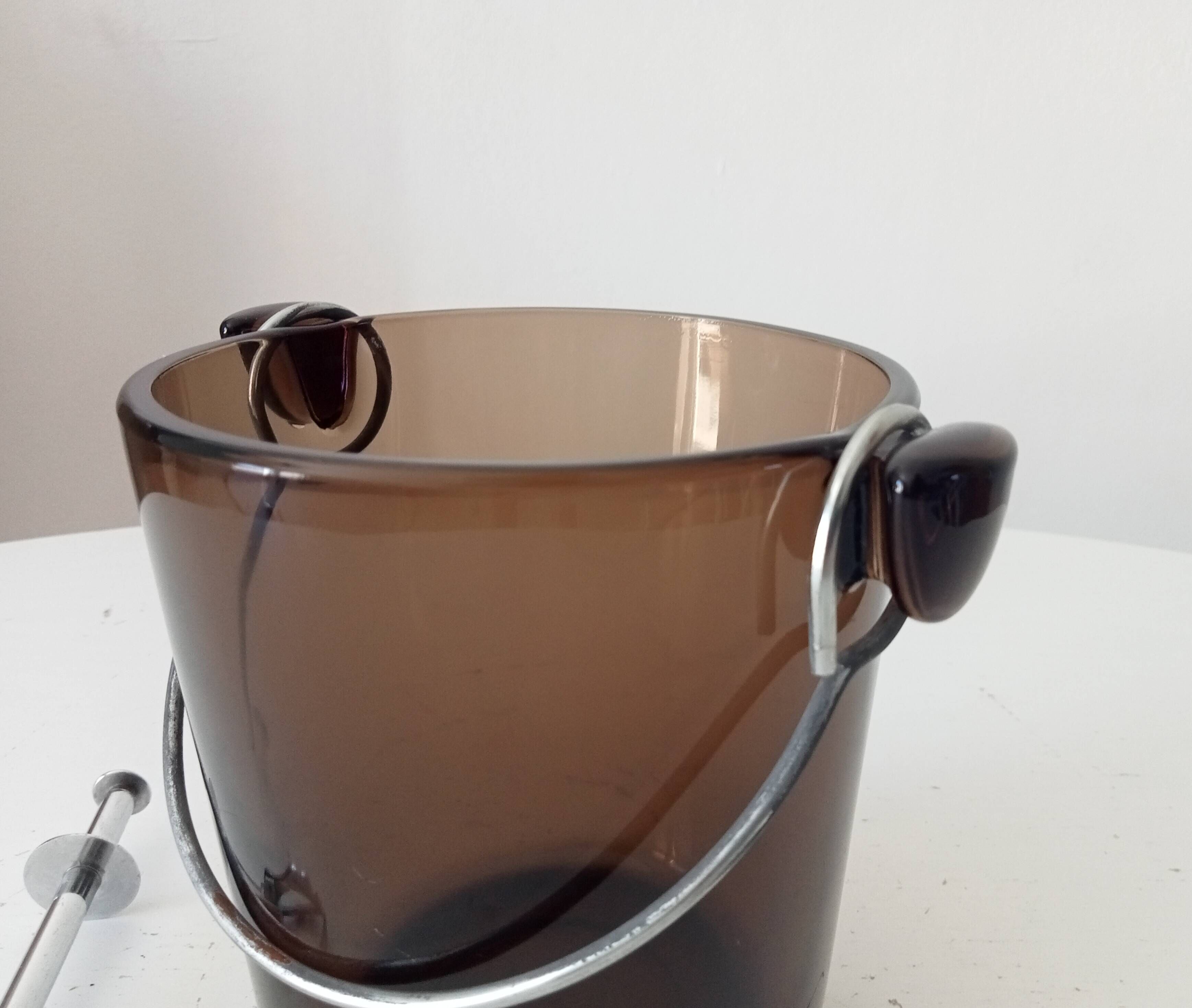Vintage 1970s ice bucket and tongs.