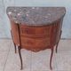Half-moon commode in Louis XV style with walnut veneer.