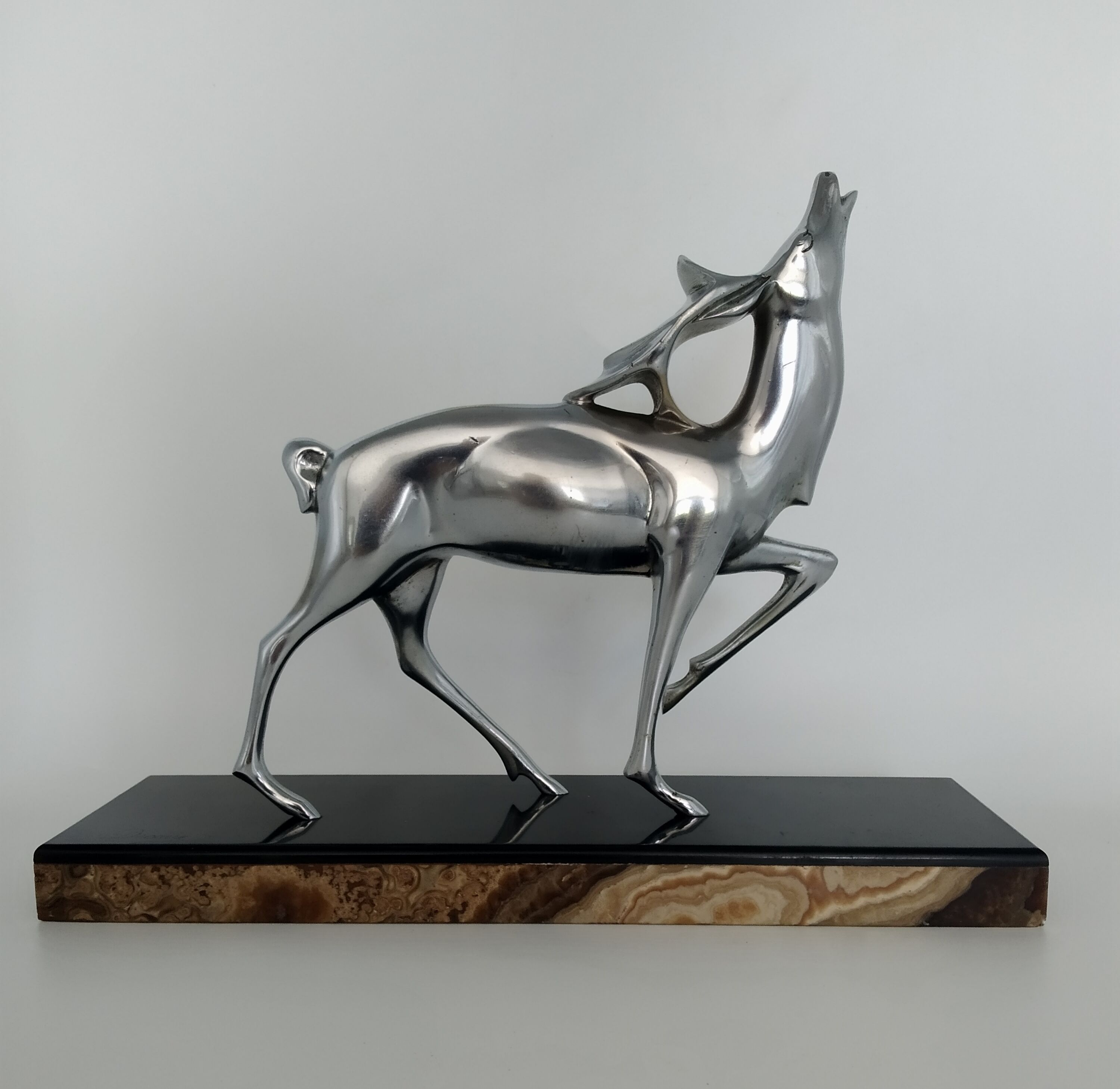 Silvered bronze sculpture signed by Michel Decoux.