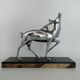 Silvered bronze sculpture signed by Michel Decoux.