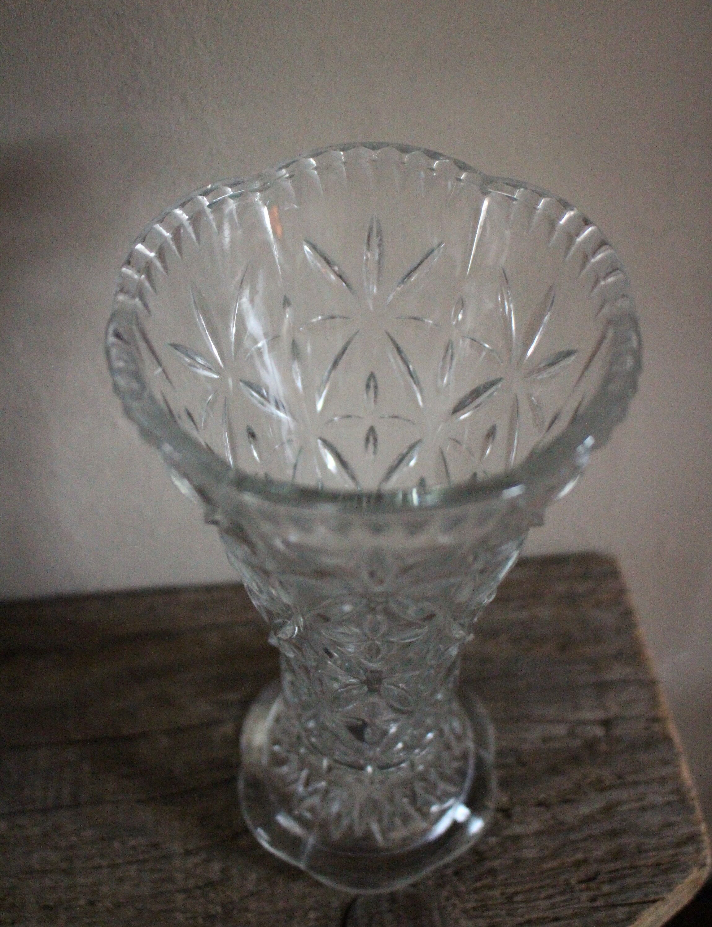 Transparent carved glass vase flowers