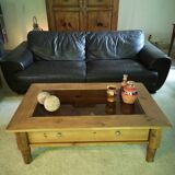 Table basse vitrée en pin.
