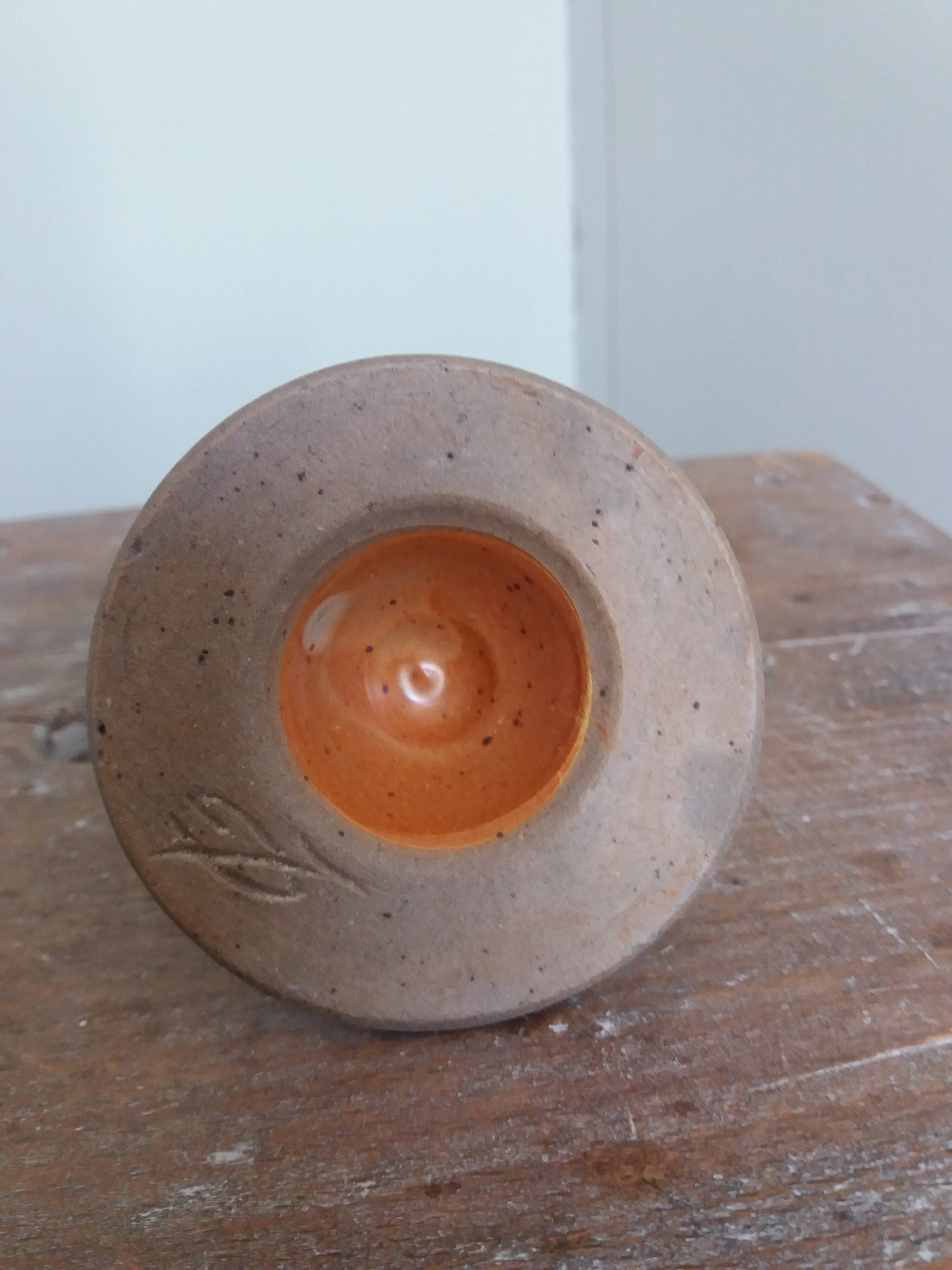 Anthropomorphic sandstone egg cup signed GL