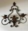 1940s wrought iron wall sconce with candles and foliage design