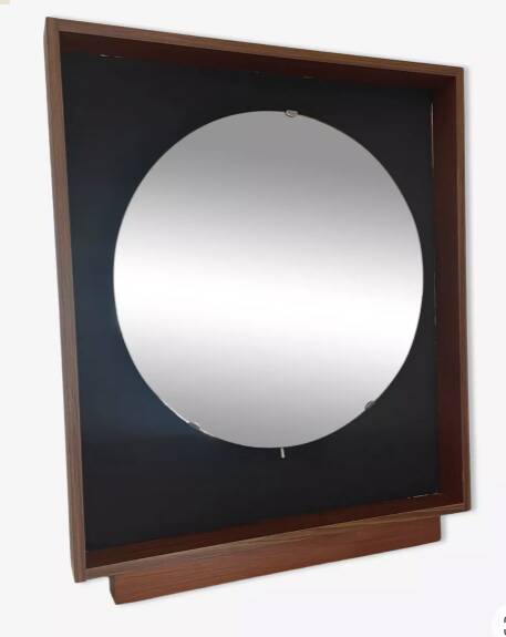 Scandinavian mirror with wooden frame and backlighting.