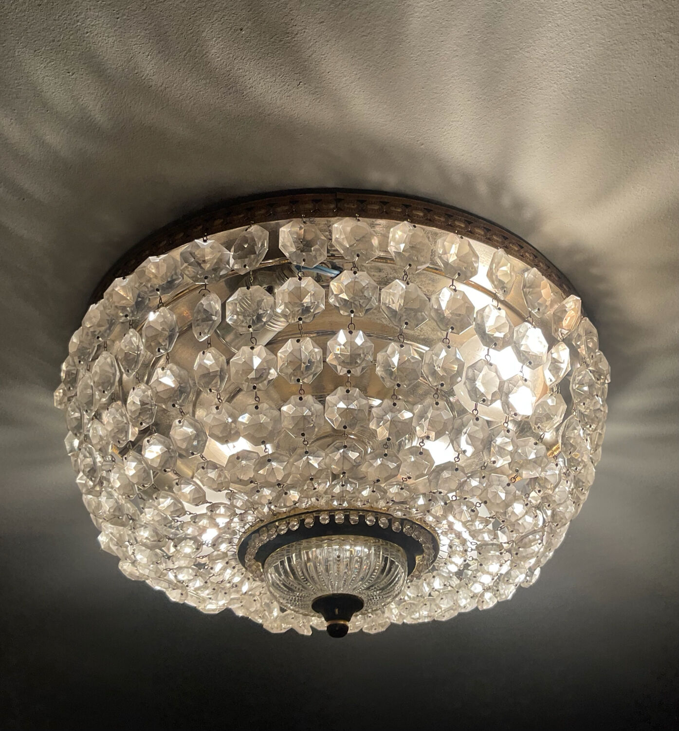 Vintage ceiling light with pendants and brass.