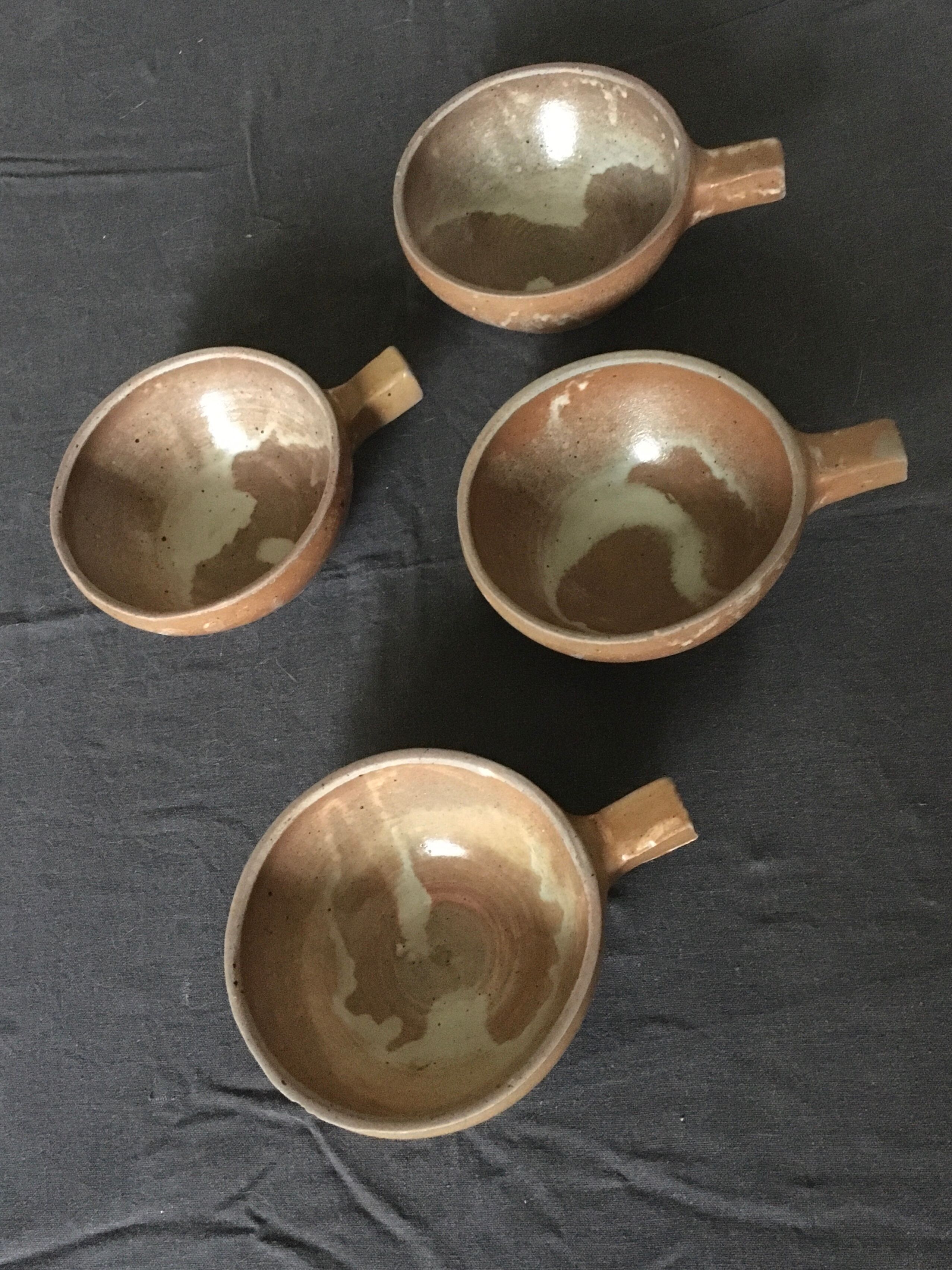 4 enamelled sandstone bowls